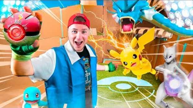 Video POKEMON BOX FORT BATTLE IRL! Catching My First Pokemon in English