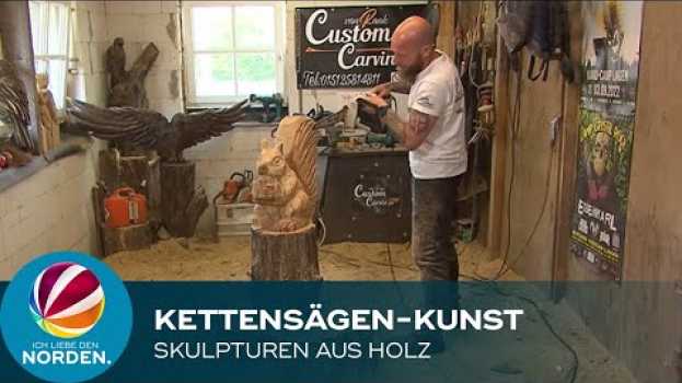 Video Kettensägenkünstler erstellt Skulpturen aus Holz en español
